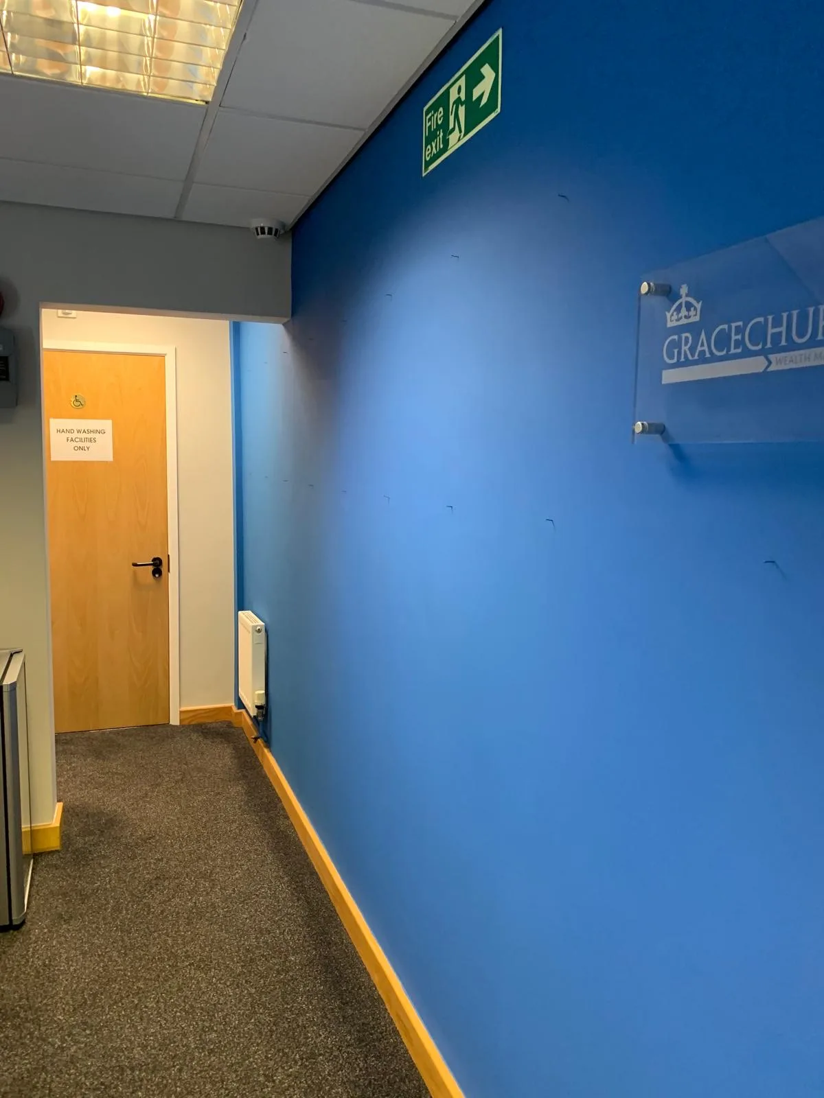 Gracechurch Oldbrook Offices — Office corridor painted in corporate blue