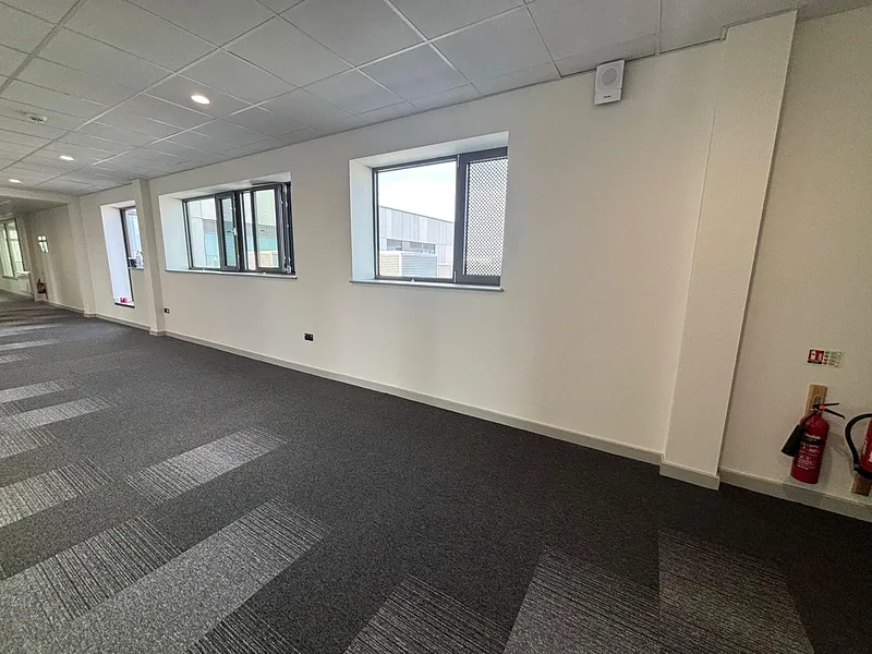 Glebe Farm School — Open classroom with crisp white ceiling