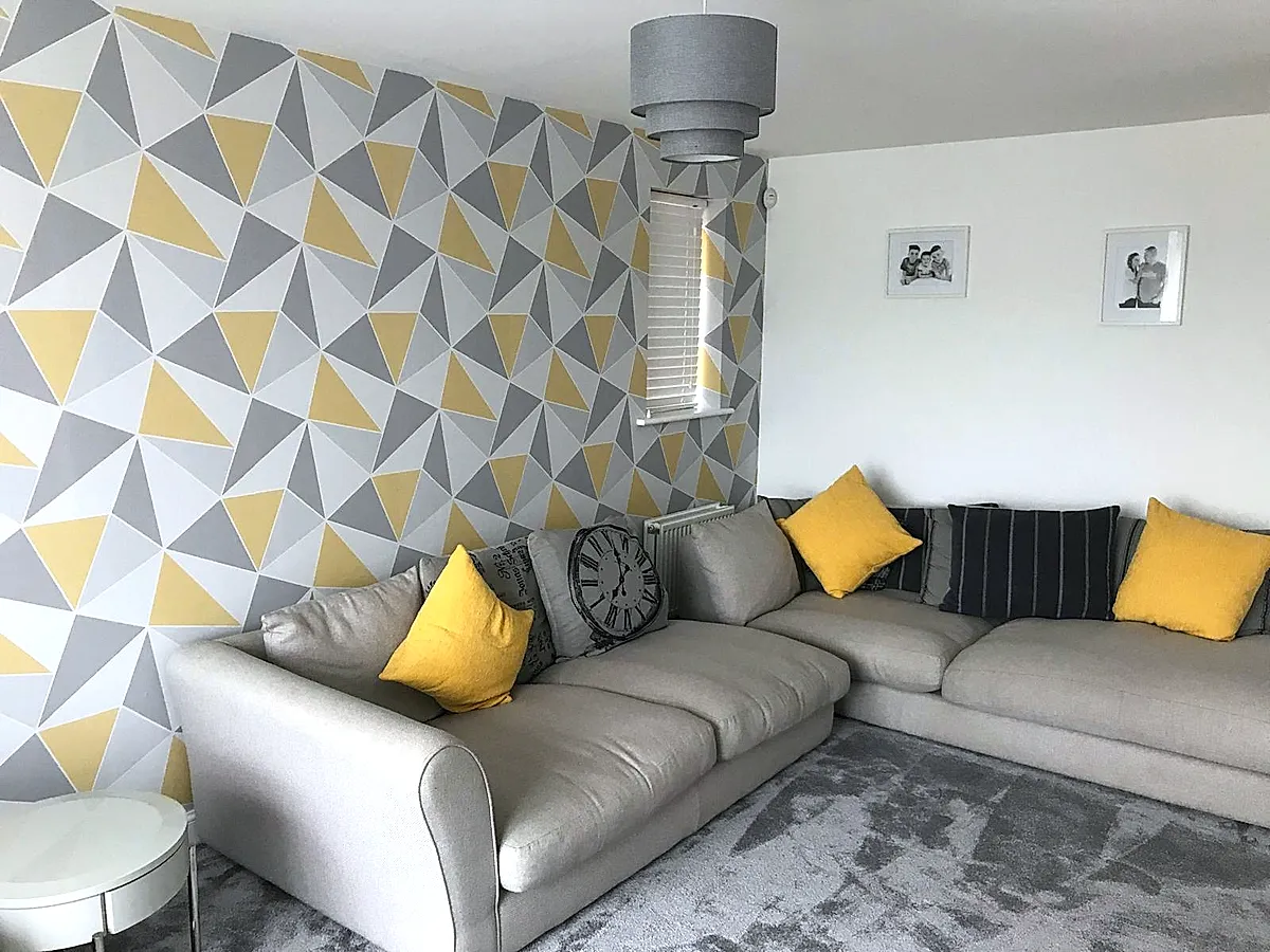 Brooklands — Geometric triangle feature wall in lounge