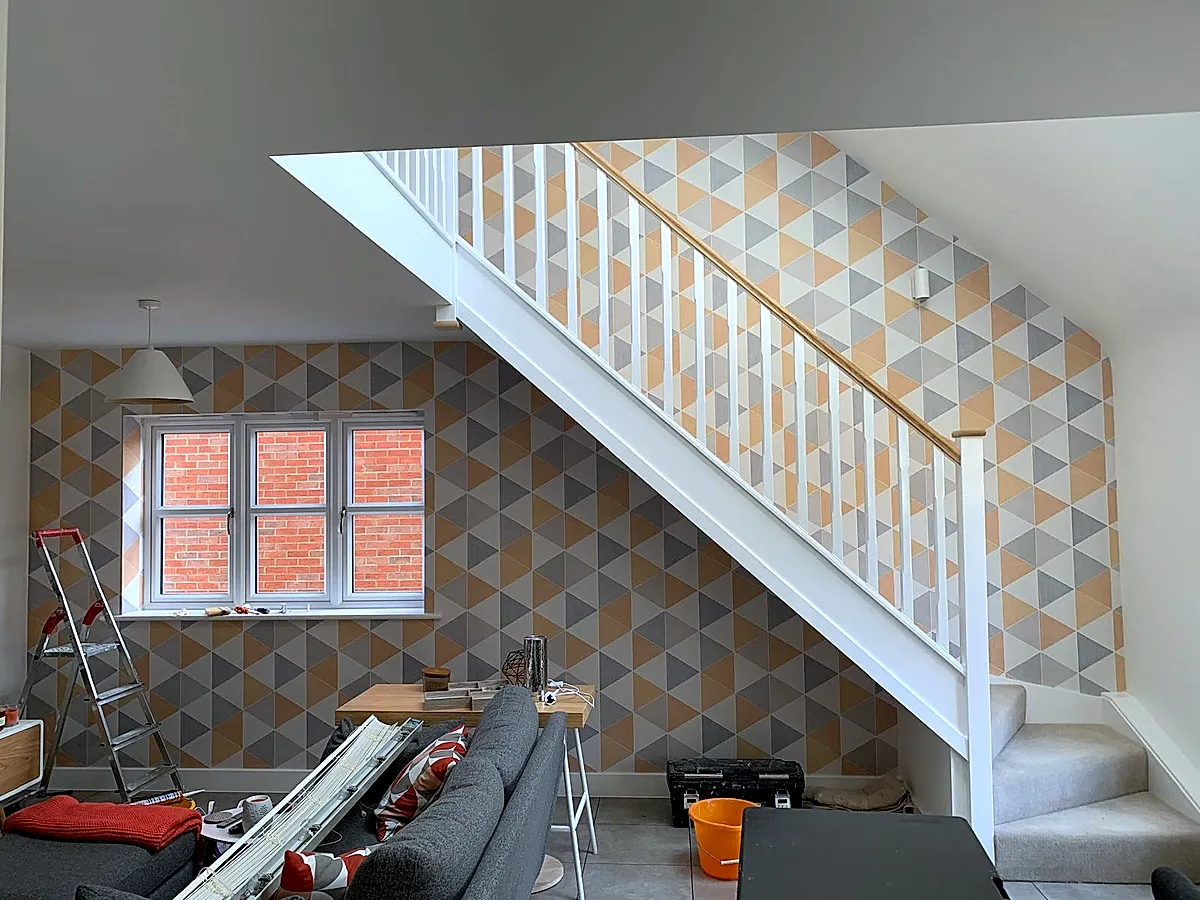 Cranfield — Geometric triangle wallpaper around staircase