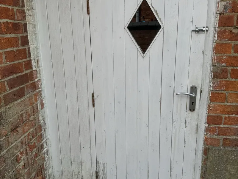 Garage Door Restoration - Before